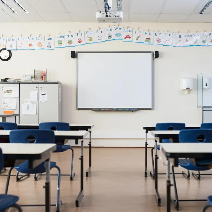 Classroom with desks and learning displays